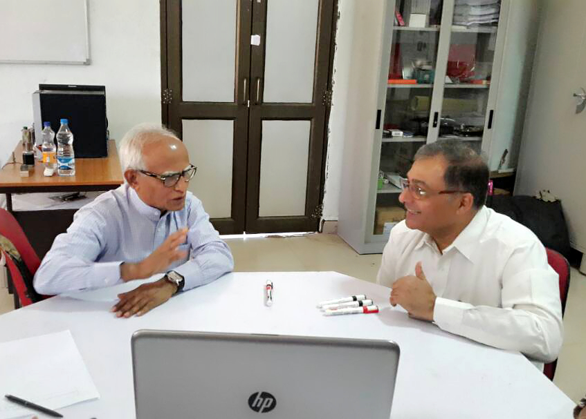 Discussion between Prof. Mustafizur Rahman and Prof. Puneet Tandon during his visit at deLOGIC lab, PDPM IIITDMJ.